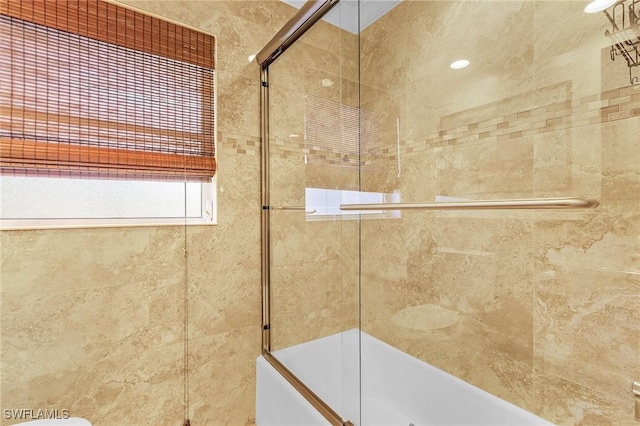 full bathroom with combined bath / shower with glass door