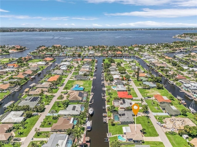 aerial view featuring a water view and a residential view