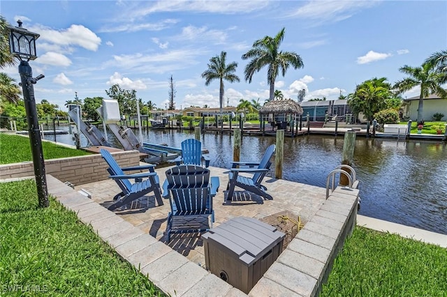 dock area featuring a water view and boat lift