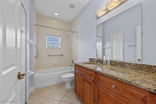 bathroom with bathtub / shower combination, visible vents, toilet, vanity, and tile patterned flooring