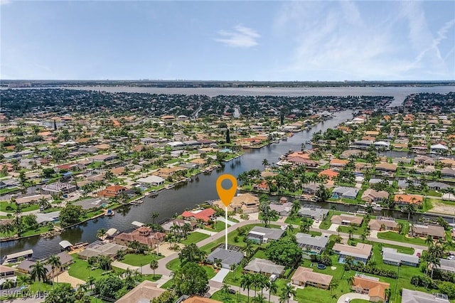 aerial view with a water view and a residential view