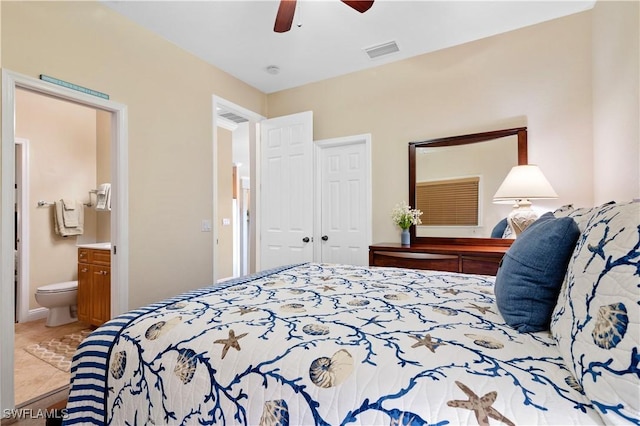 bedroom featuring visible vents, ceiling fan, and ensuite bathroom