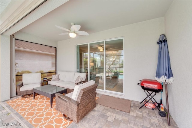 view of patio / terrace with a ceiling fan, outdoor lounge area, and area for grilling