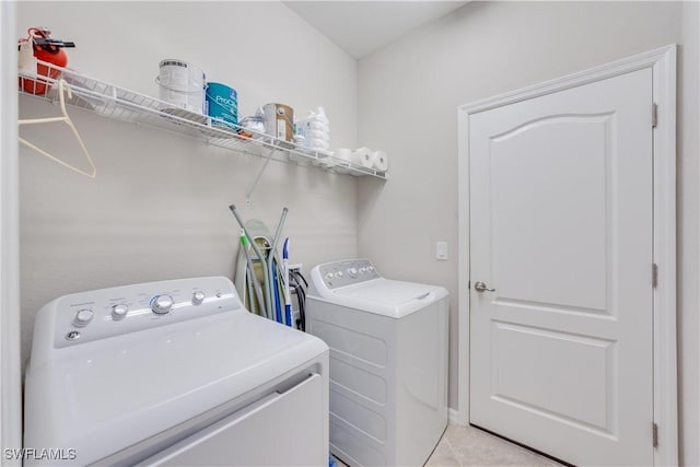 washroom with washer and dryer and laundry area