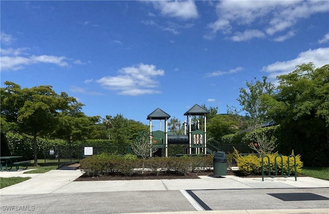 view of community featuring playground community