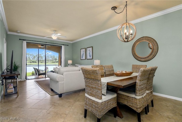 dining room with ornamental molding, light tile patterned flooring, baseboards, and ceiling fan with notable chandelier