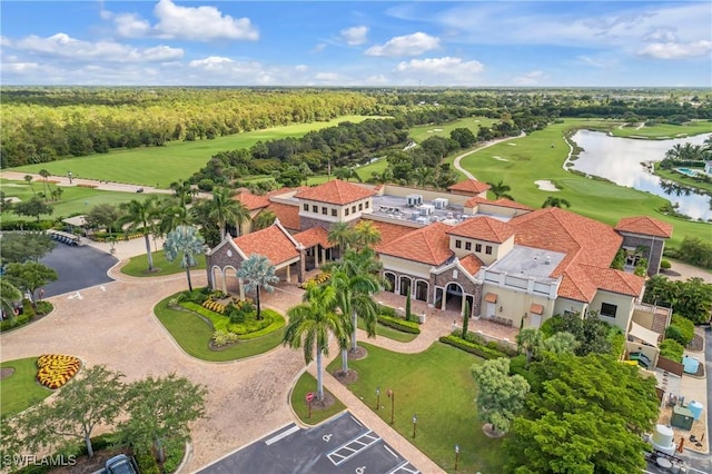 drone / aerial view featuring a water view and view of golf course