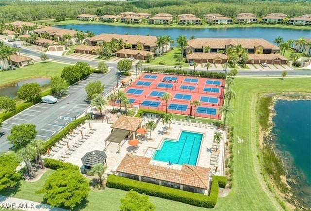 aerial view featuring a water view and a residential view