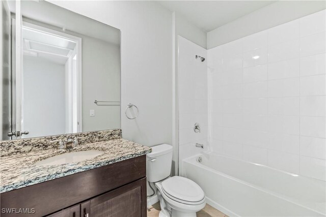full bathroom featuring toilet, vanity, and shower / tub combination