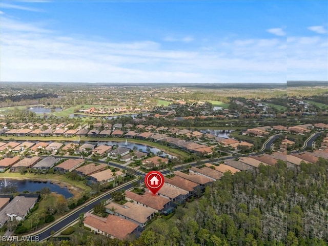 aerial view featuring a water view and a residential view