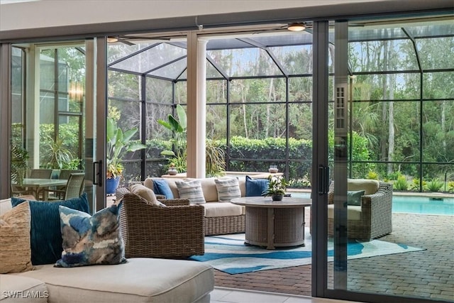 sunroom / solarium with ceiling fan