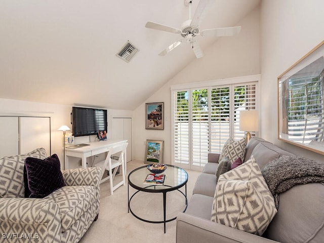 living area with light carpet, ceiling fan, vaulted ceiling, and visible vents