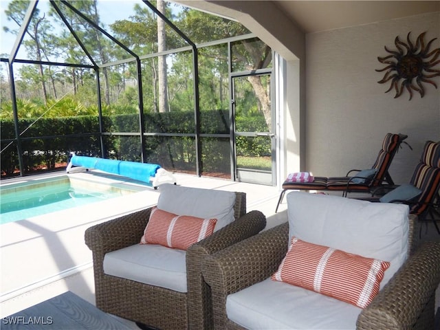 view of patio featuring an outdoor living space and glass enclosure