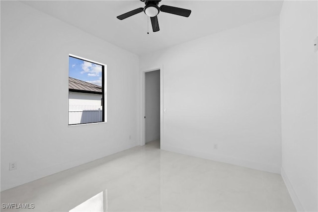 unfurnished room with ceiling fan