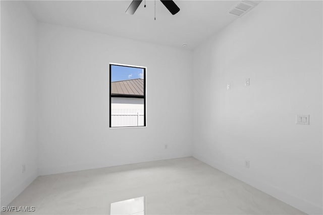 unfurnished room with ceiling fan and visible vents