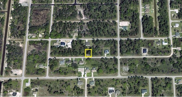 1125 Copley St E, Lehigh Acres, FL 33974 - aerial map of property and surrounding area featuring property boundaries highlighted