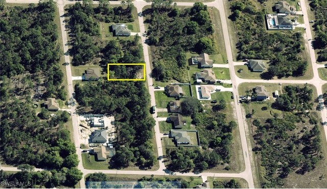 1125 Copley St E, Lehigh Acres, FL 33974 - aerial overview of property's location featuring property boundaries highlighted