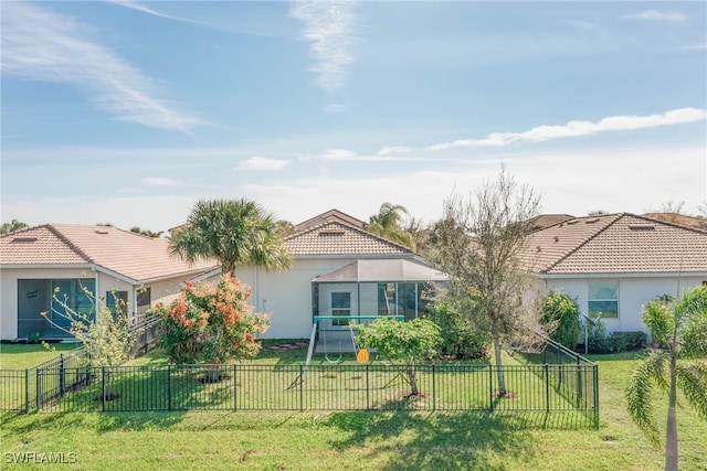 view of front of property featuring a front yard and stucco siding