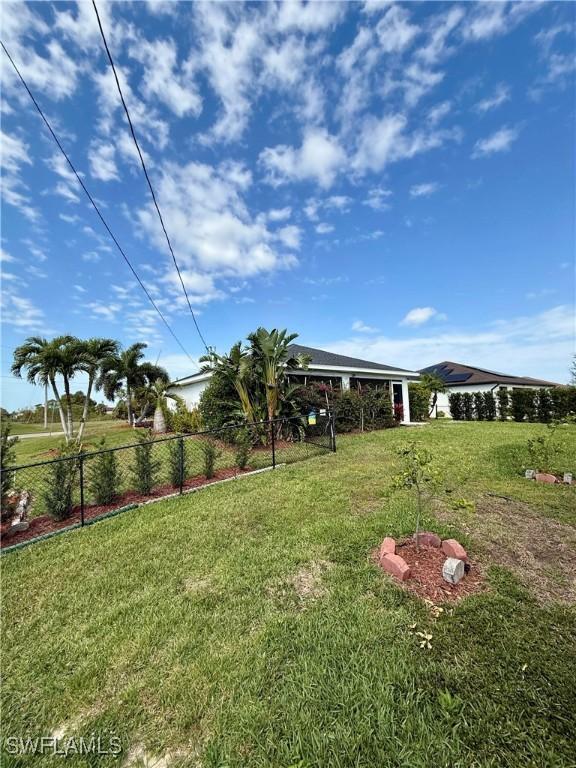 view of yard featuring fence