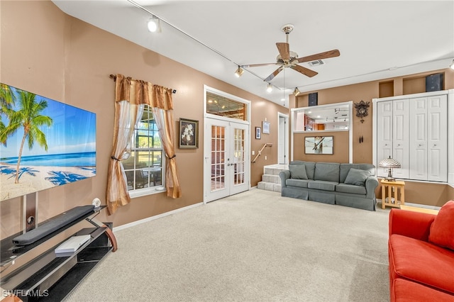 living area featuring visible vents, a ceiling fan, french doors, carpet, and rail lighting