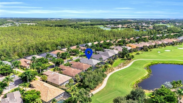 birds eye view of property featuring a water view, view of golf course, and a residential view