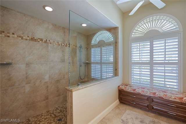 bathroom with ensuite bathroom, a walk in shower, recessed lighting, a ceiling fan, and tile patterned floors