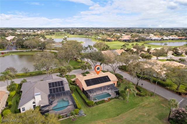 bird's eye view with a water view and a residential view