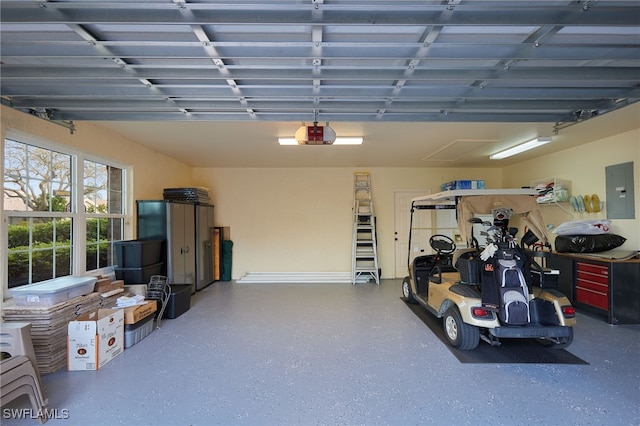 garage with electric panel and a garage door opener