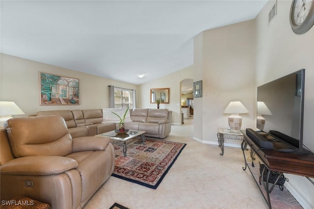 15773 Beachcomber Ave, Fort Myers, FL 33908 - living room featuring arched walkways, lofted ceiling, visible vents, and baseboards
