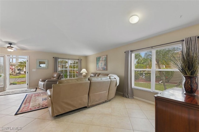 15773 Beachcomber Ave, Fort Myers, FL 33908 - living area featuring ceiling fan, baseboards, and light tile patterned floors