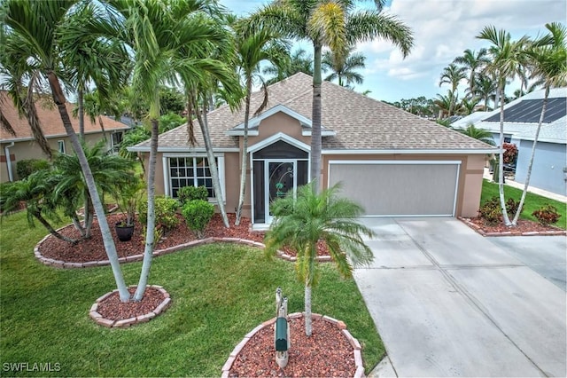 ranch-style house featuring stucco siding, a shingled roof, concrete driveway, an attached garage, and a front yard