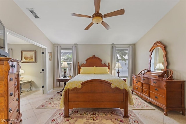 15773 Beachcomber Ave, Fort Myers, FL 33908 - bedroom featuring lofted ceiling, visible vents, a ceiling fan, light tile patterned flooring, and baseboards