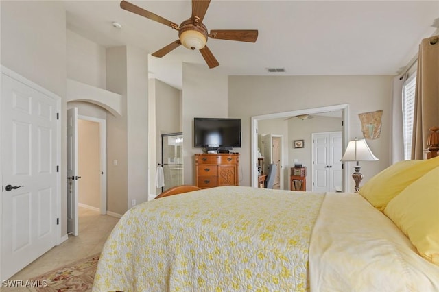 15773 Beachcomber Ave, Fort Myers, FL 33908 - bedroom featuring visible vents, a ceiling fan, vaulted ceiling, ensuite bath, and baseboards