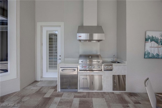 view of patio / terrace featuring an outdoor kitchen, a sink, and area for grilling