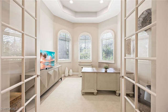 office with recessed lighting, french doors, a raised ceiling, and baseboards