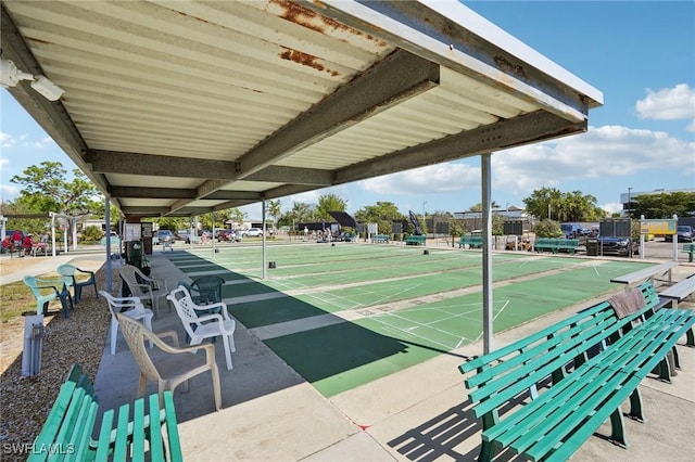 view of property's community with shuffleboard