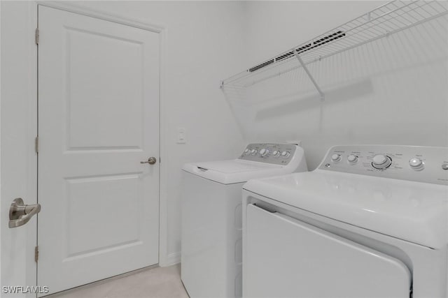 laundry room with laundry area and independent washer and dryer