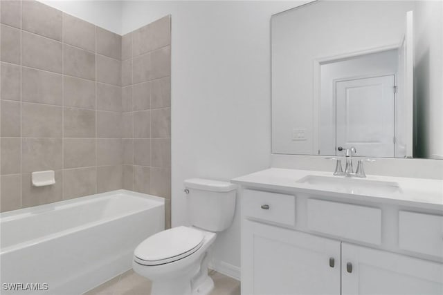 full bathroom featuring toilet, tile patterned floors, and vanity