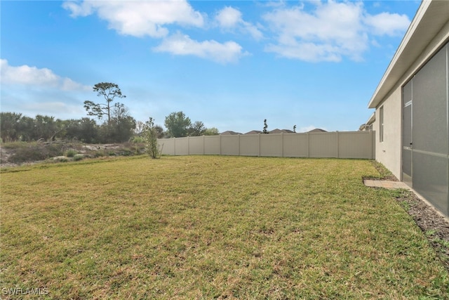 view of yard with fence