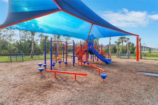 community play area featuring fence