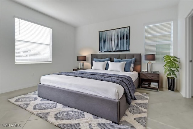 bedroom with tile patterned floors