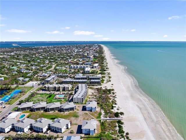 aerial view with a view of the beach and a water view