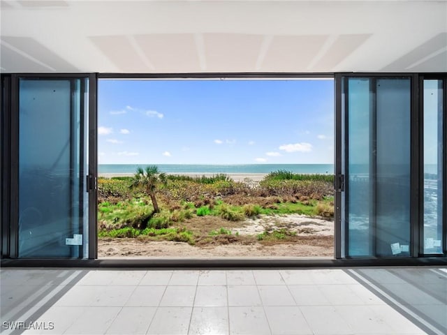 entryway with a water view