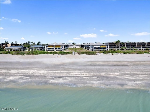 exterior space featuring a beach view