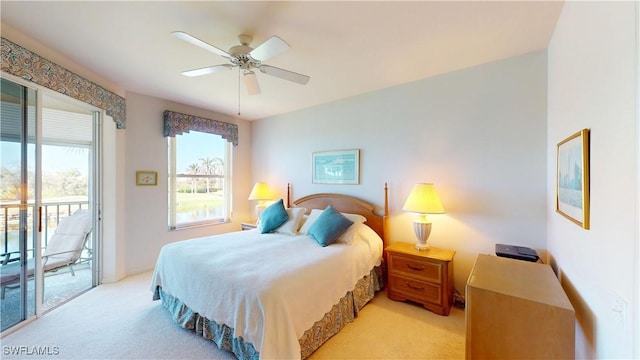 bedroom featuring light carpet, ceiling fan, and access to exterior