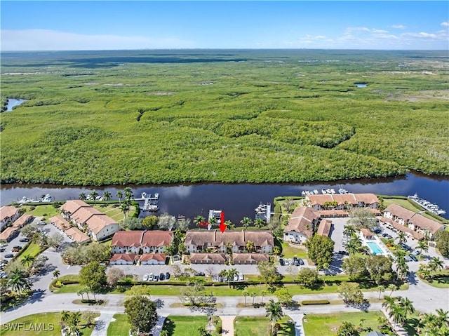 aerial view with a water view and a residential view