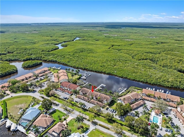 aerial view with a residential view and a water view