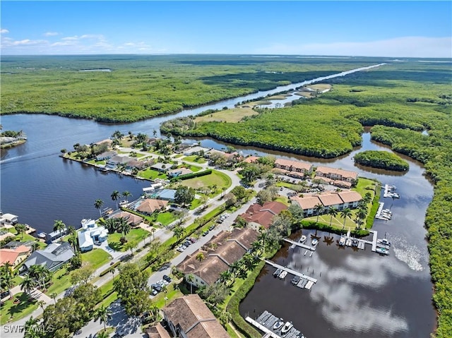 bird's eye view featuring a residential view and a water view