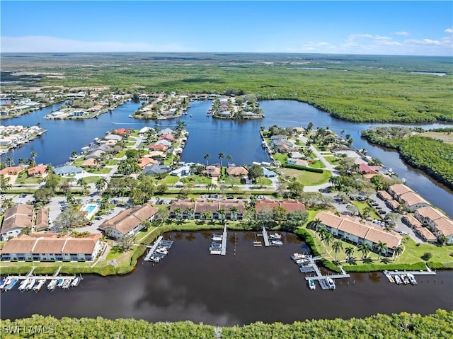 bird's eye view with a water view