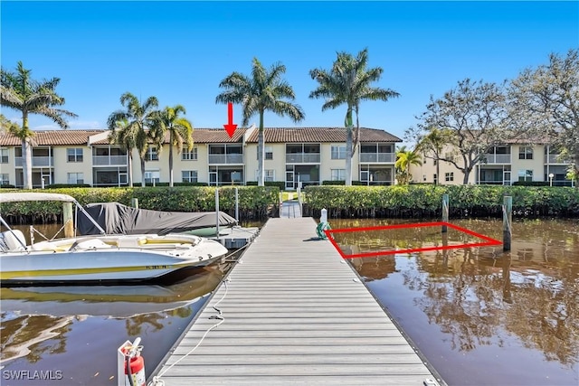 view of dock with a water view